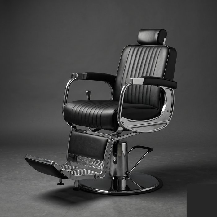 Reclining barber's chair with hydraulic base and headrest