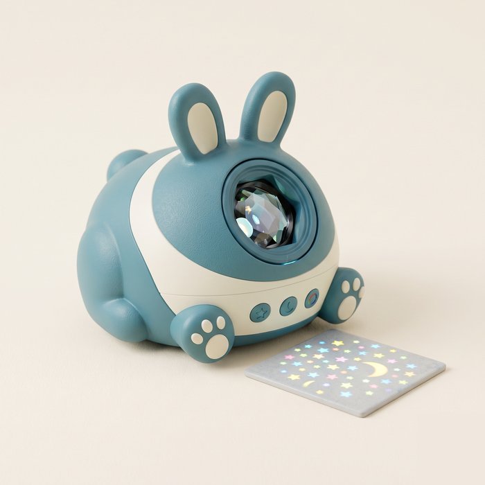 Projetor infantil em formato de animal fofo projetando estrelas coloridas